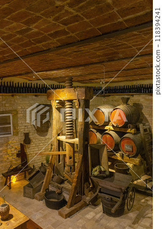 Traditional winemaking equipment in Castello di Razzano, Piedmont, Italy Traditional winemaking equipment in Castello di Razzano, Piedmont, Italy 118394241