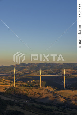 Multi-span cable stayed Millau Viaduct across gorge valley of Tarn River, Aveyron Departement, France 118394636