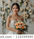 Smiling bride holding a bouquet 118394940