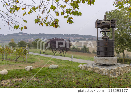 Old wine press near Castello di Razzano and Alfiano Natta, Barolo wine region, province of Cuneo, region of Piedmont, Italy Old wine press near Castello di Razzano and Alfiano Natta, Barolo wine region, province of Cuneo, region of Piedmont, Italy 118395177