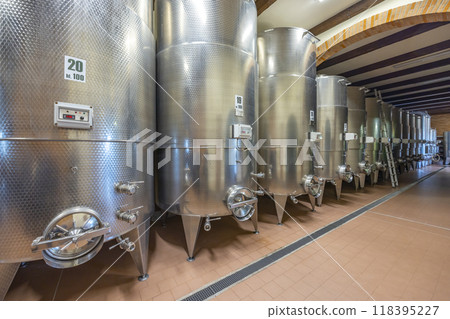 Modern production wine cellar with stainless steel tank, Canale, Piedmont, Italy Modern production wine cellar with stainless steel tank, Canale, Piedmont, Italy 118395227