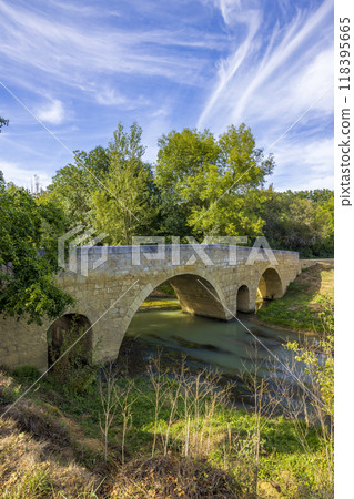 Romanesque bridge of Artigue and river Osse near Larressingle on route to Santiago de Compostela, UNESCO World Heritage Site, departement Gers, France Romanesque bridge of Artigue and river Osse near Larressingle on route to Santiago de Compostela, UNESCO World Heritage Site, departement Gers, France 118395665