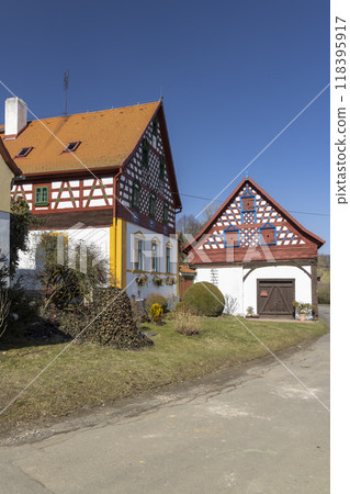 Half-timbered farmhouse, folk architecture in Doubrava, Western Bohemia, Czech Republic 118395917