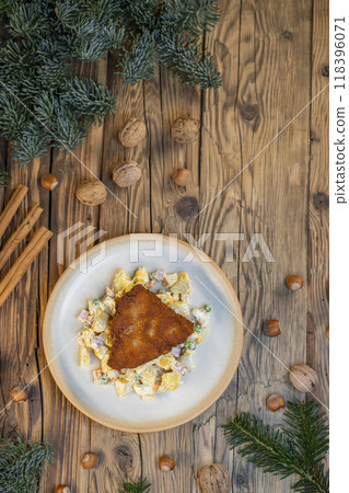 Traditional Christmas dinner in Czech Republic - carp fillet with potato salad Traditional Christmas dinner in Czech Republic - carp fillet with potato salad 118396071