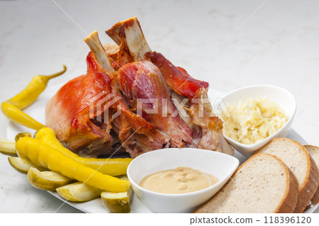 roasted pork knee with picked vegetables, bread and mustard roasted pork knee with picked vegetables, bread and mustard 118396120