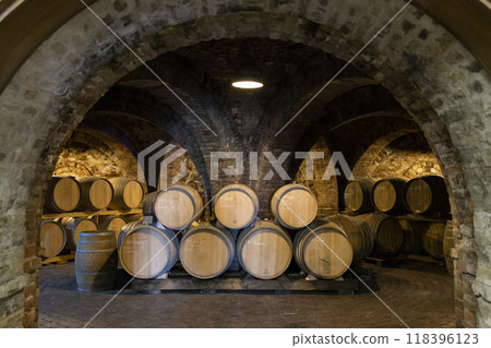 wine barrels in the cellar, Szekszard, Hungary 118396123