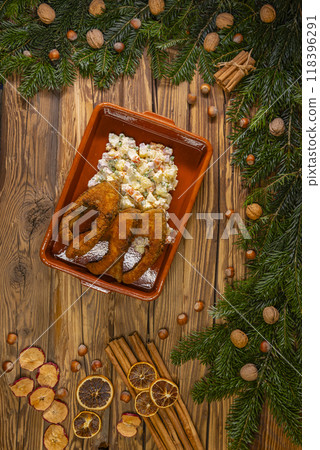 Traditional Christmas dinner in Czech Republic - fried carp with potato salad 118396291