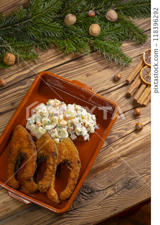 Traditional Christmas dinner in Czech Republic - fried carp with potato salad 118396292