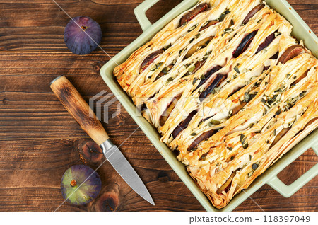 Pie or tart, homemade pie crust with figs. 118397049
