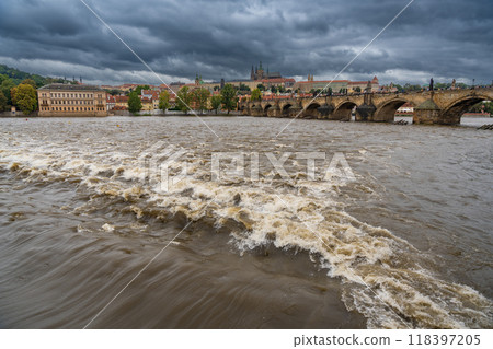 Flood in Prague. View of Prague Castle across the flooding river Vltava, Prague 118397205