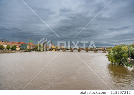 Flood in Prague. View of Charles Bridge over the flooding river Vltava, Prague 118397212