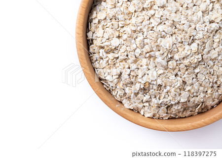 Rolled oats, healthy breakfast cereal oat flakes in bowl isolated on white background 118397275