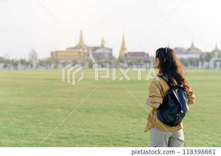 Traveler asian woman in her 30s explores its grandeur. Discover the religious beauty and history of Bangkok with her journey. 118398661