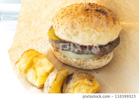Delicious hamburger and french fries Delicious hamburger and french fries 118399323