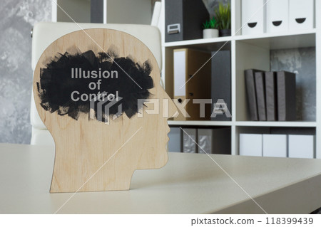 Head model with the phrase illusion of control. Cognitive bias and psychological perception. Head model with the phrase illusion of control. Cognitive bias and psychological perception. 118399439