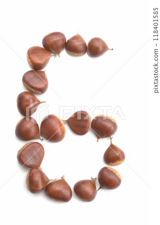 Number 6 made of chestnuts on a white background 118401585