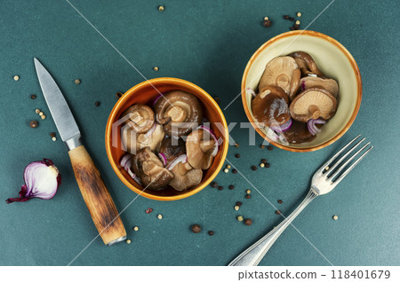 Salted pickled mushrooms. 118401679