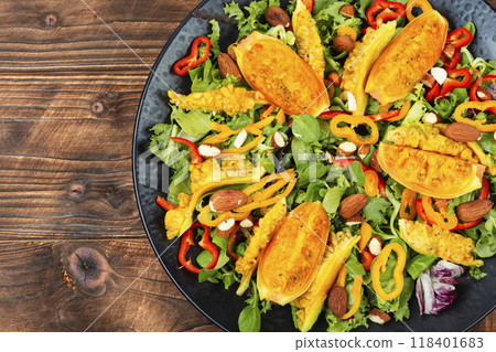 Salad of cactus fruits, peppers and almonds. 118401683