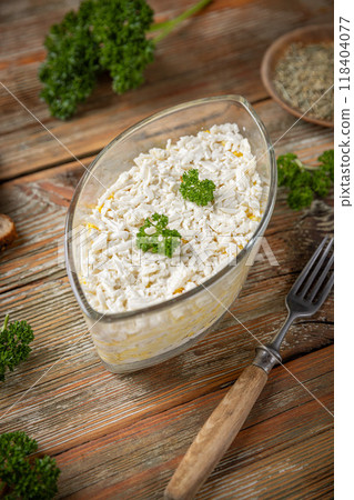 Grated cheese with polenta 118404077