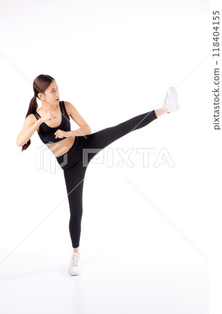 Portrait beautiful young asian woman in sportswear workout with kick and exercise isolated. Portrait beautiful young asian woman in sportswear workout with kick and exercise isolated. 118404155
