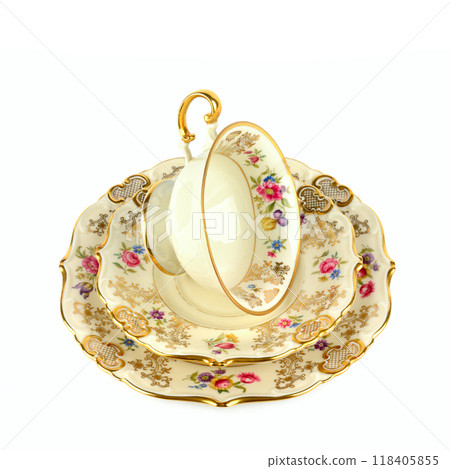Vintage porcelain cups and saucer isolated on white. Vintage porcelain cups and saucer isolated on white. 118405855