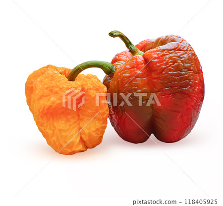 Red Yellow Wilted sweet bell pepper fruits with wrinkled skin . Red Yellow Wilted sweet bell pepper fruits with wrinkled skin . 118405925