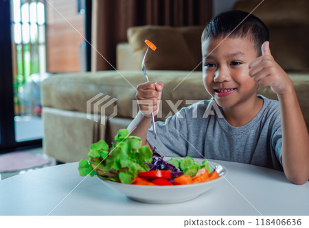 Children like to eat vegetables, Little cute boy eat healthy vegetables, Nutrition healthy eating habits for kids concept, Mixed color vegetables. Children like to eat vegetables, Little cute boy eat healthy vegetables, Nutrition healthy eating habits for kids concept, Mixed color vegetables. 118406636