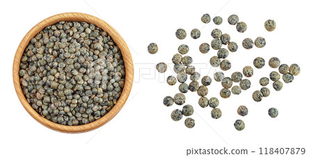 raw french green lentils in wooden bowl isolated on white background. Top view. Flat lay 118407879