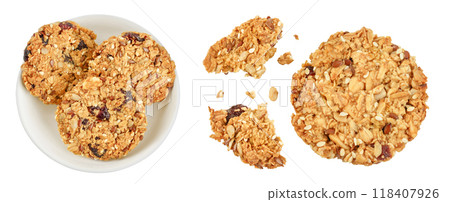 Granola cookie in ceramic bowl isolated on white background with full depth of field. Top view. Flat lay. Granola cookie in ceramic bowl isolated on white background with full depth of field. Top view. Flat lay. 118407926