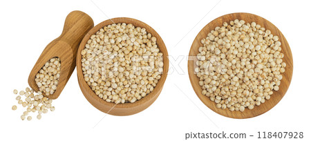 Sorghum seeds in wooden bowl and scoop isolated on white background. Top view. Flat lay. Sorghum seeds in wooden bowl and scoop isolated on white background. Top view. Flat lay. 118407928