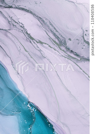 Abstract fluid art showcasing blue and white marbling patterns with hints of metallic gold on a smooth surface 118408586
