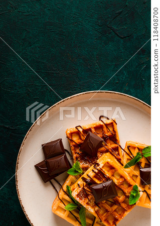 Viennese waffles, with chocolate, breakfast, on a dark background, no people, selective focus, Viennese waffles, with chocolate, breakfast, on a dark background, no people, selective focus, 118408700
