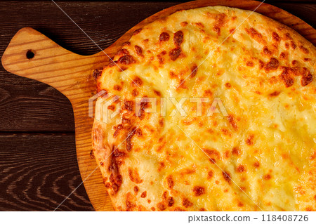 Imereti khachapuri, Traditional Georgian dish, flatbread with cheese, top view, no people, rustic, 118408726