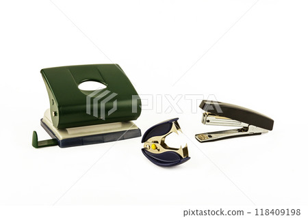 Puncher, stapler and anti-stapler on a light background Puncher, stapler and anti-stapler on a light background 118409198