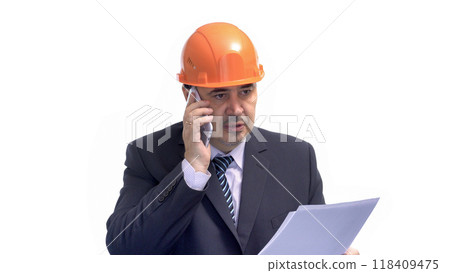 Construction Engineer in Hard Hat Talking on the Phone 118409475