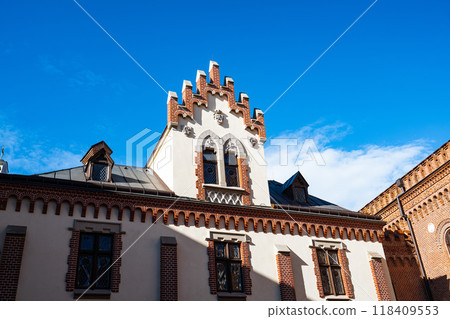 Old Krakow architecture, decorative brickwork and white walls Old Krakow architecture, decorative brickwork and white walls 118409553