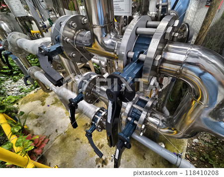 A collection of pipes is interconnected with each other A collection of pipes is interconnected with each other 118410208