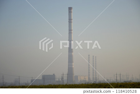 power plant in the rays of the sun at dawn 118410528