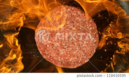 Hamburger Minced Raw Beef Steak on Grill with Flames. 118410595