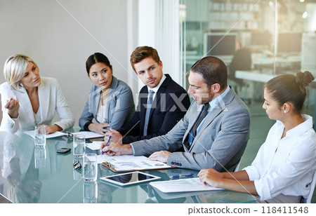 Corporate group in business meeting, team discussion in conference room with diversity in workplace. Men, women and professional planning with conversation, collaboration and analytics paperwork Corporate group in business meeting, team discussion in conference room with diversity in workplace. Men, women and professional planning with conversation, collaboration and analytics paperwork 118411548