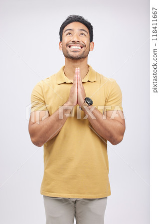 Man, prayer hands and studio with looking up, smile and communication with God by white background. Student, praying and mindfulness with religion, gratitude and worship for peace, hope or meditation Man, prayer hands and studio with looking up, smile and communication with God by white background. Student, praying and mindfulness with religion, gratitude and worship for peace, hope or meditation 118411667