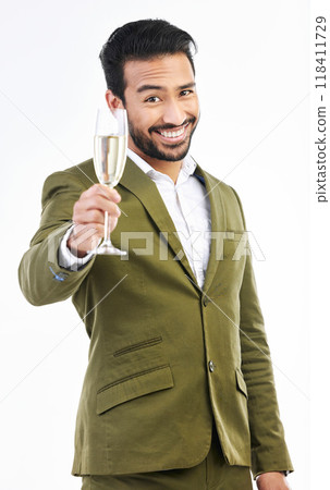 Business man, portrait and wine glass for cheers, celebration and happy hour of success on white background. Smile, entrepreneur and toast of champagne, alcohol and drinks in studio for winning offer Business man, portrait and wine glass for cheers, celebration and happy hour of success on white background. Smile, entrepreneur and toast of champagne, alcohol and drinks in studio for winning offer 118411729