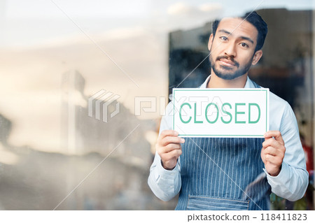 Asian man, small business and closed sign for out of service in coffee shop or restaurant closing. Portrait of male entrepreneur, manager or waiter holding billboard or poster sorry for close in cafe Asian man, small business and closed sign for out of service in coffee shop or restaurant closing. Portrait of male entrepreneur, manager or waiter holding billboard or poster sorry for close in cafe 118411823