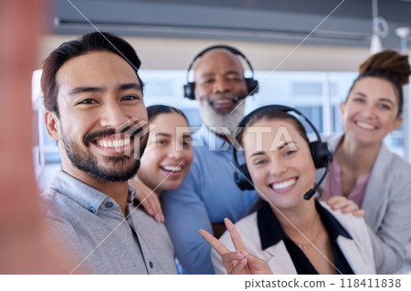 Team building, smile or call center people selfie in telemarketing company or agency together. CRM support, portrait or happy customer services employees laughing or bonding in telecom sales office Team building, smile or call center people selfie in telemarketing company or agency together. CRM support, portrait or happy customer services employees laughing or bonding in telecom sales office 118411838