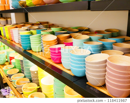 A souvenir shop in Vietnam with a variety of colorful cups A souvenir shop in Vietnam with a variety of colorful cups 118411987