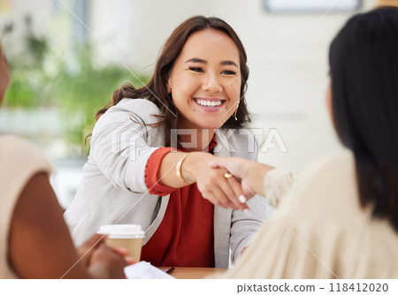 Happy, welcome and business people with a handshake in a meeting for partnership and agreement. Smile, thank you and corporate women shaking hands in an office for a contract, onboarding and greeting Happy, welcome and business people with a handshake in a meeting for partnership and agreement. Smile, thank you and corporate women shaking hands in an office for a contract, onboarding and greeting 118412020