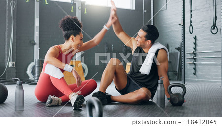 Happy couple, gym and high five for teamwork, motivation or training together in workout or exercise. Excited man and woman touching hands for team sports, goals or fitness achievement at health club 118412045