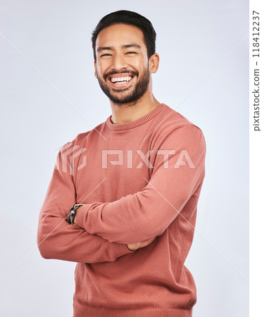 Portrait, happy or Asian man laughing with arms crossed or smile in studio in casual fashion or clothes. Relax, confidence or handsome male person smiling on white background with pride, humor or joy 118412237
