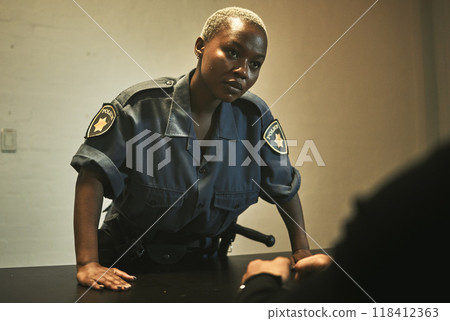 Investigation, jail and police talking to criminal for interview, interrogation and arrested in station. Security, law and female officer with man, burglar or thief for crime, stealing and theft Investigation, jail and police talking to criminal for interview, interrogation and arrested in station. Security, law and female officer with man, burglar or thief for crime, stealing and theft 118412363