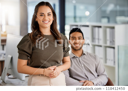 Happy, confidence and portrait of business people in the office in conversation for collaboration. Success, friends and corporate team working together on a project sitting by a desk in the workplace Happy, confidence and portrait of business people in the office in conversation for collaboration. Success, friends and corporate team working together on a project sitting by a desk in the workplace 118412450